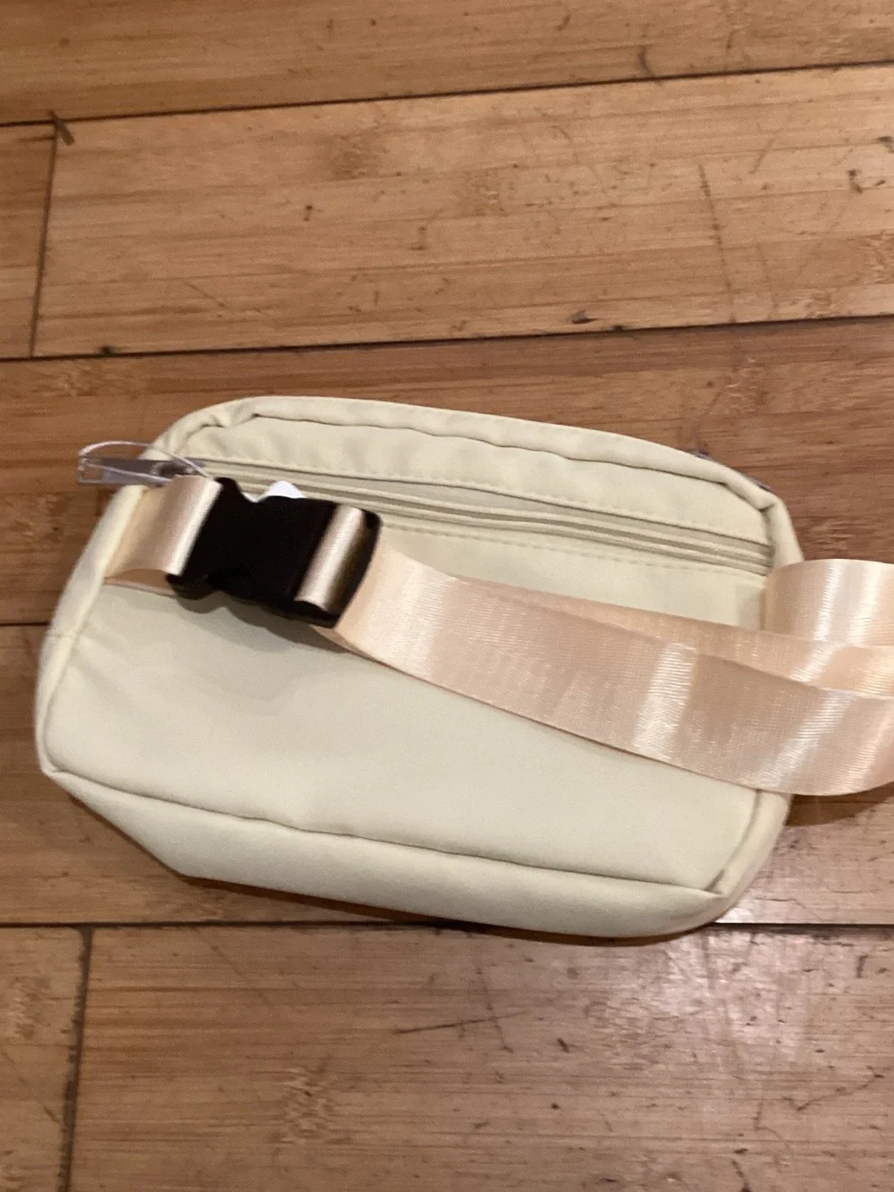 Cream Crossbody Belt Bag with Red and Pearl Bead Embellishment